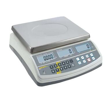 Compact scales with reference weight and quantity